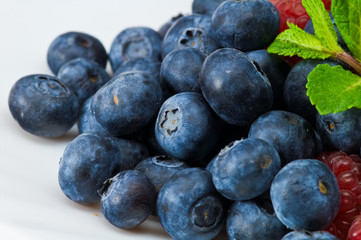 Blueberry and rasperry with mint leaves