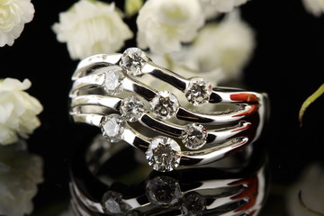 diamond ring reflecting on black background