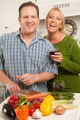 Couple Enjoying An Evening in Their Kitchen