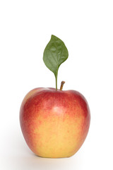 Nice red apple with green leaf isolated on white background