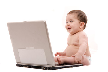 baby working on laptop