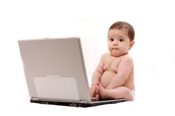 baby working on laptop