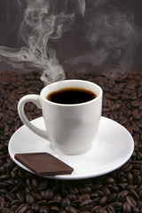 porcelain coffee cup and chocolate