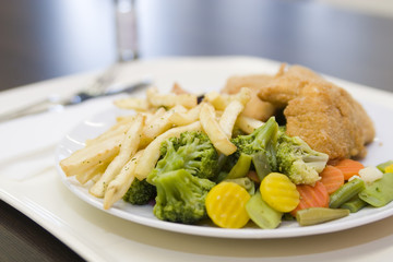 chees in crumbs with a roast potato