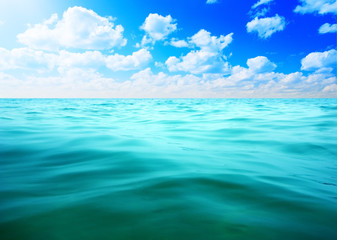 Fototapeta na wymiar oceans water and blue sky