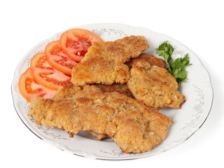 Schnitzels with tomato and parsley