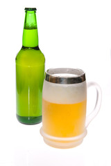 Beer mug and bottle on white background
