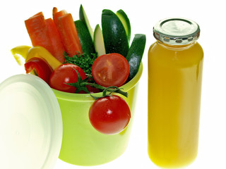 school and work lunch box, raw veggies and fruit juice