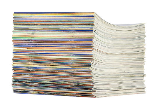 Pile of magazines isolated on white