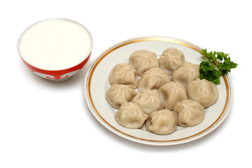 russian ravioli (pelmeni) with sour cream