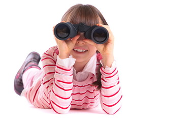 Girl playing with binoculars