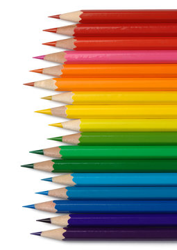 Colorful crayons arranged in line by colors