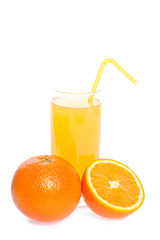 orange and juice in glass