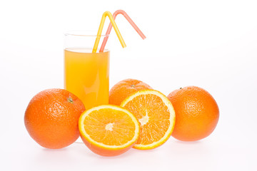 orange and juice in glass