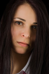 Fototapeta premium Pretty businesswoman isolated on black