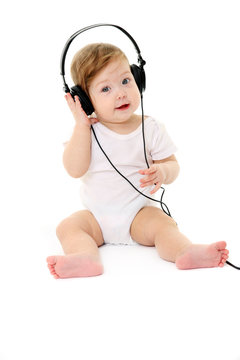 Happy Singing Baby Wearing Big Black Headphones