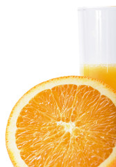 Close up of   orange slice and orange juice in glass