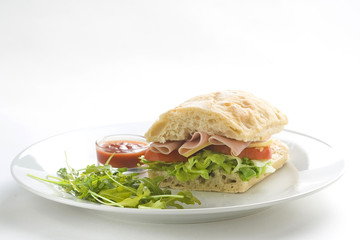 delicious sandwich of ham cheese lettuce tomato