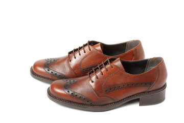 Two brown shoes isolated on white