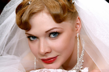Young beautiful bride with red hair
