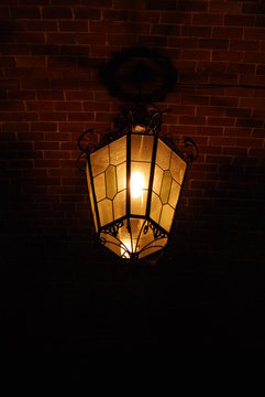 Ancient Lantern On A Wall