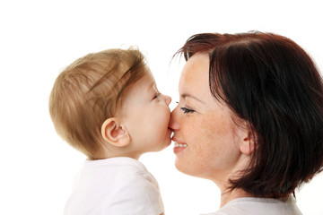 laughing baby playing with mother