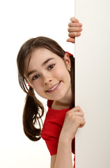 Beautiful girl holding empty board