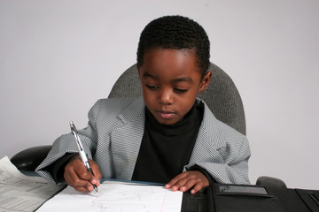 Boy playing executive