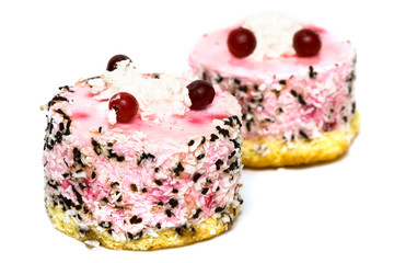 Pink cakes on white background