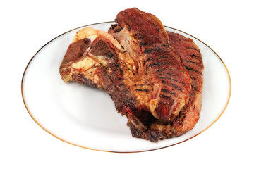 steak with bone in on dish