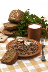 place setting with boiled buckwheat on served table