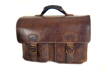 Old briefcase isolated in white