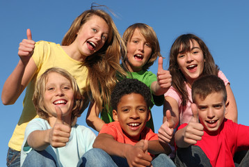 diverse grop of kids, children or tweens thumbs up - 12489791