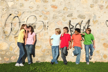 first love, adolescent children flirting and whispering