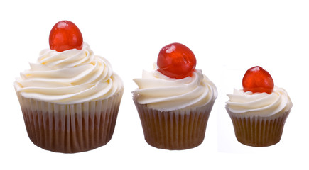 Three cherry cupcakes