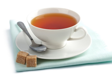 cup of tea and brown sugar isolated