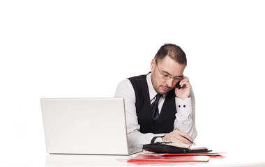 Man behind a desk organizing his day