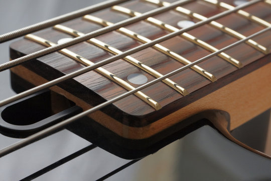 Guitar strings and fingerboard