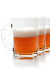 A row of beer pints