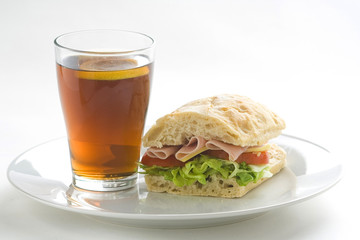 delicious sandwich of ham cheese lettuce tomato