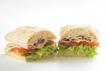 delicious sandwich of ham cheese lettuce tomato