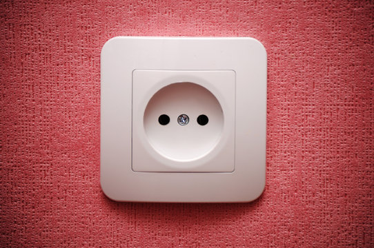 Electric plug connector (outlet) on the wall