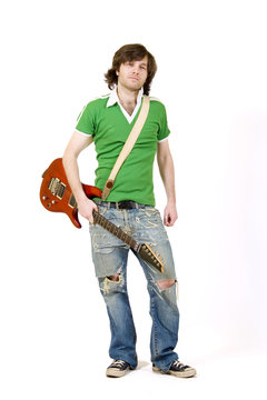 guitarist with his guitar on shoulder