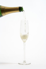 filling a glass with champagne