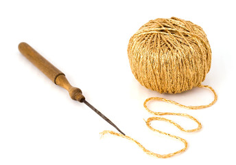 Gold thread and old needle