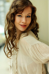 Fototapeta premium Close-up portrait and beautiful young fashion model