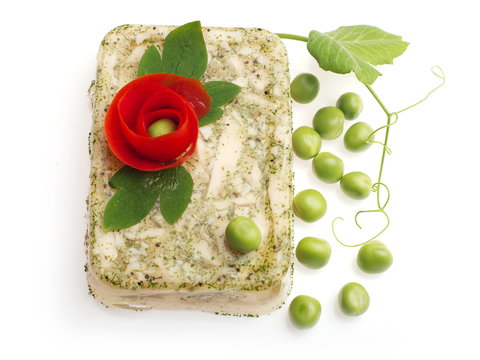 Aspic From Bird Decorated With Tomato Flower And Green Pea...