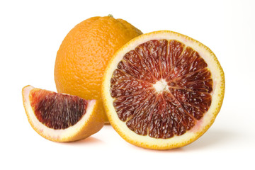 Fresh Whole and sectioned blood oranges