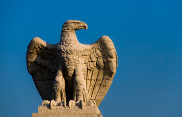 Close up of an old statue of an eagle.
