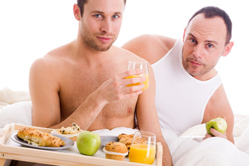 Obraz na płótnie Canvas Homo couple enjoy their breakfast